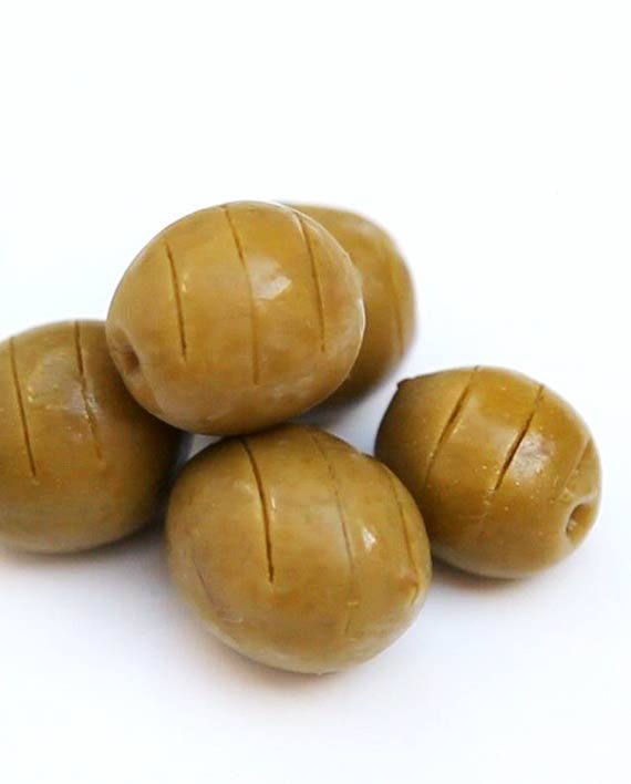 Rajar aceitunas con máquina automáticamente